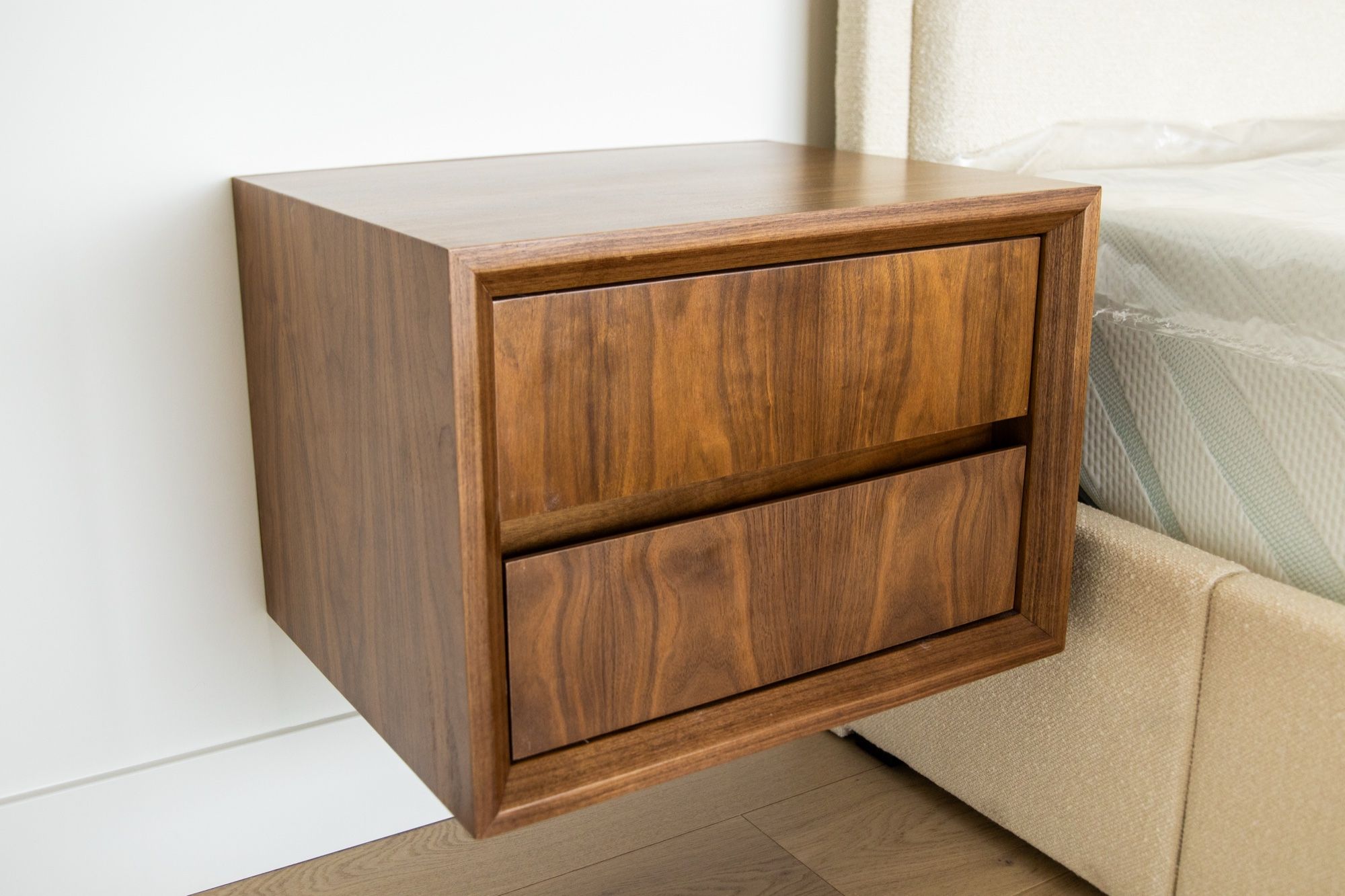Floating walnut nightstand with two drawers